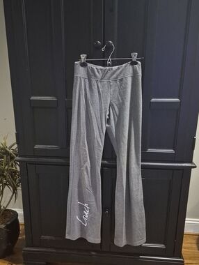 Bella Canvas Gray Yoga Pants With COACH on them